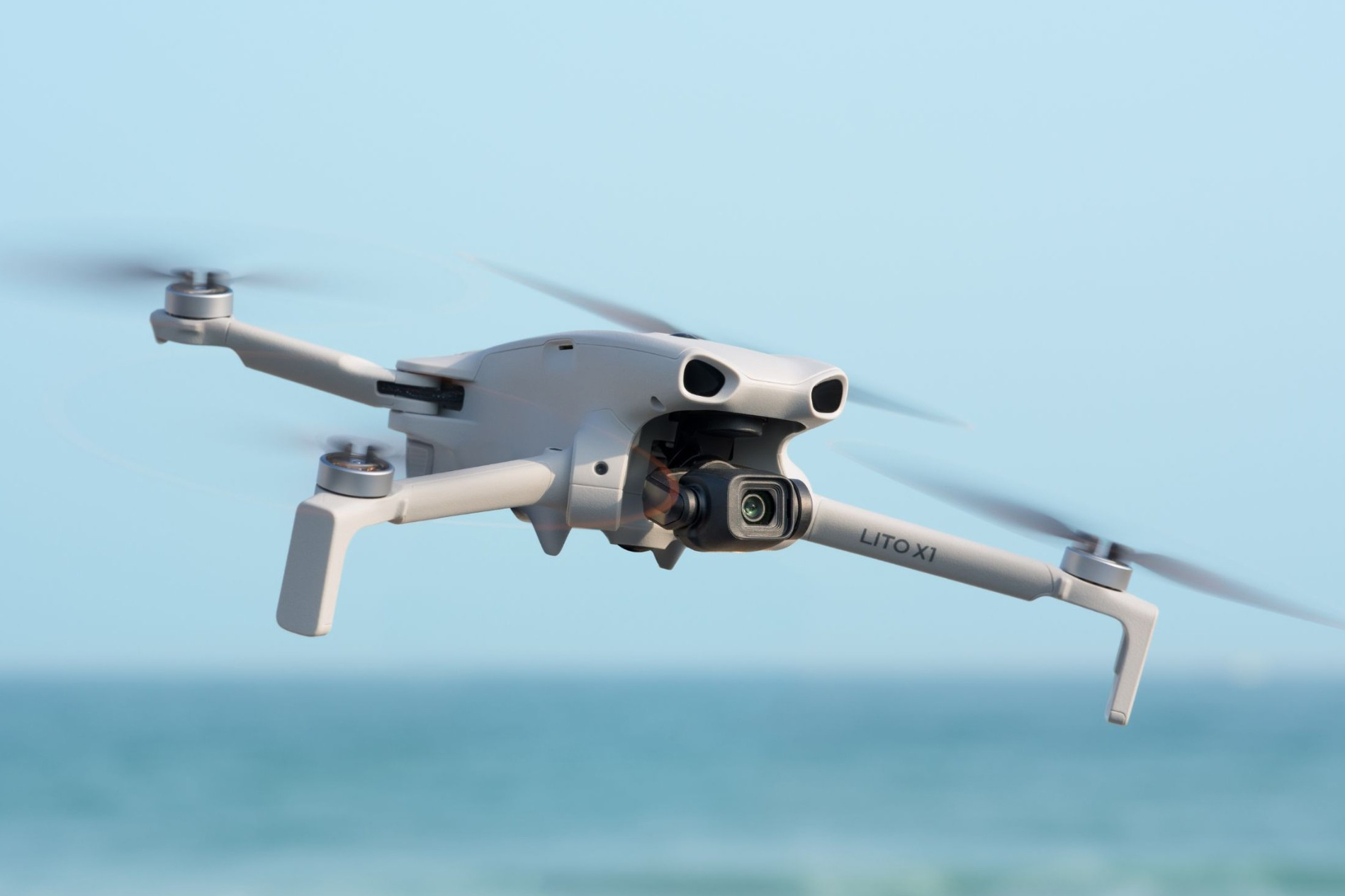 The DJI Lito X1 drone in flight.